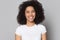 Happy african american millennial lady head shot close up portrait.