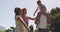 Happy african american parents, daughter and son walking outdoors