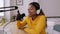 Happy african american young woman talking at online radio station from home