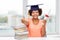 Happy african bachelor girl with books and diploma