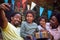 Happy afro-american family  with childs at birthday party have fun and making selfie