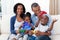 Happy Afro-american family playing video games