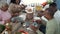 Happy Afro family having healthy lunch together at home