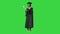 Happy afro graduating female student dancing on a Green Screen, Chroma Key.