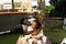 Happy Afro mother and son having fun eating in a street food truck market