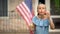 Happy american girl blowing foam bubbles, having fun, happy childhood concept