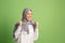 Happy arab woman in hijab. Portrait of smiling girl, posing at studio background