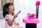 Happy Asian Chinese Liitle Girl Playing Make-Up Toys