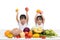 Happy Asian Chinese little sisters with fruit and vegetable