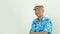 Happy Asian elderly man in Hawaii shirt ready for retirement holiday