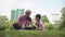 Happy Asian family children using tablet with her grandfather