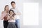 Happy Asian family Woman and a Man with junior girl smiling and fun in the white background, Lovely family, save with Clipping pat