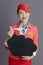 happy asian female air hostess showing blank cloud shape board