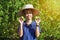 Happy Asian female gardeners harvesting organic fresh green lime in the gardens