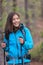 Happy Asian hiker girl in nature forest hiking