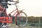 Happy Asian hipster women with bicycle on the road