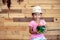 Happy asian little girl is holding watermelon blended juice