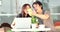 Happy asian man with girl friend using cell phone and laptop computer together