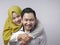 Happy Asian Muslim Couple