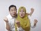 Happy Asian Muslim Couple Shows Winning Gesture