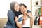 Happy Asian muslim mother hug her little boy, single mom and kid being happy family together, motherhood concept