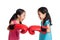 Happy Asian twins girls with boxing gloves