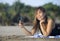 Happy Asian woman using mobile phone taking selfie portrait photo having fun relaxed