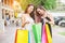Happy Asian women friendship enjoying spending shopping bags in