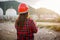 Happy Asian worker woman in oil chemical industry worker working visual inspection list on clipboard in plant