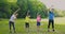 Happy asian young family exercising  together at the park