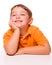 Happy attentive child sitting at desk