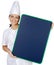 Happy attractive cook woman whit slate