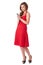 Happy attractive female in red dress text someone