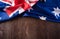 Happy Australia day concept. Australian flag against old wooden background. 26 January