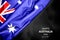 Happy Australia Day - January 26th. Australian flag on dark background