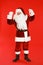 Happy authentic Santa  on red background