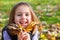 Happy autumn preschool girl