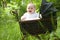 Happy baby in vintage pram