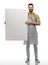Happy barman in apron holding empty white board