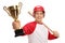 Happy baseball player holding a bat and a gold trophy