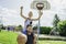 Happy basketball family portrait play this sport on summer season. The father play with boy