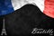 Happy Bastille Day on July 14th. French Independence Day written on a black background with the French flag.