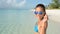 Happy beach lifestyle sunglasses girl smiling fun