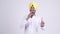 Happy bearded Indian Sikh businessman singing with microphone