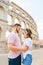 happy beautiful couple in front of coliseum in Pula Croatia