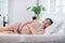 Happy Beautiful Pregnant Asian Woman lying on bed smile and sleep with big belly so comfortable and relax,Pregnancy of young woman