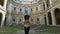 Happy and beautiful tourist women walk with a map looking for orientation in Rome