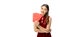 Happy beautiful young Chinese woman in red chinese dress holding red money envelopes against white background