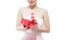 Happy beautiful young woman opening heart shape red gift box