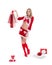 Happy beautyful woman in red santa claus clothes with shopping bags